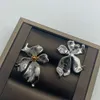 Designer Celiene Jewelry Celins Celi / Saijia New Maple Leaf Flower Mirror Silver Style Personality Trend Temperament Fashion Earrings