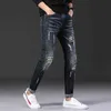 Jeans para hombres Marca elástica de la marca Hombres de mezclilla Ruined High Street Fashion Patch Trendy Slim Fit Cool Daily New Lleza Hip Hop Pants D240417