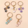 Keychains Lanyards Cute Enamel Keychain Colorful Sakura Flower Key Ring Sweet Key Chains for Women Girls Handbag Accessories DIY Jewelry Gifts d240417