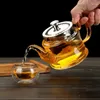 Flacons de hanche à thermor de thé en verre transparent résistant à la chaleur couvercle en acier inoxydable épaissi avec du jus de boisson de drain intégrée