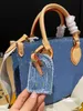 Top original Single Original NOVO Design de Moda Classic Saga de jeans de jeans feminina Solita de ombro destacável Super chique Casual All-in-One Crossbody Bag