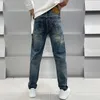 Heren jeans ontwerper herfst en winter jeans heren katoenen lente slank fit zwarte high -end blauwe broek