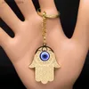 Keychains Lanyards Hand of Fatima Turkish Evil Blue Eye Key Chain for Women Men rostfritt stål Guldfärg Hamsa Palm Keychain Jewelry K1139S01 Y240417