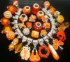 Whole in Bulk 100pcsLot mixed Orange Color Charms for Jewelry Making Loose DIY Big Hole Charms for European Bracelet1476913