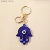 Keychains Lanyards Resin Evil Eye Hamsa Hand Vis Keychains Beyring voor vrouwen Men Retro Fatima Hand Turkse Lucky Blue Eye Bag autobox Accessoires Y240417