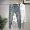 Mäns jeans harajuku sommarkoreansk street stil vintage herrkläder lyxiga byxor smala denim klassiska coola nya byxor för män d240417