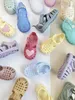 Summer Childrens Hollow Out Baotou Roman Sandals Girls Love Shoes Shoes Baby Kids Not Slip Beach Shoes 240416