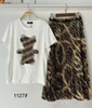 女性デザイナー2ピーススーツ幾何学パターンTシャツ半袖品質ハイウエストオーバースカート12月16日