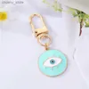 Keychains Lanyards 1 Round Evil Eye Keychain Ami Cavyring Bohemian Blue Eye Sac voiture AirPods Boîte clé Téléphone Charme Accessoire Jewelry Y240417