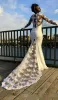 Modest African Mermaid Wedding Dresses Long Sleeves Sequins Hollow Illusion Back Sweep Train Plus Size Lace Applique Wedding Bridal Gown