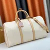 Designer Duffle Bag Fashion Peach Cabin Travel Luggage For Men Real Leather Top Quality Totes Shoulder Bags Mens Womens Handbags Double Zip Closure Padlock Name Tag