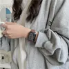 腕時計のトップデザイン女性の時計クールな若者の電子ファッション防水