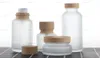 Frosted Glass Jar Lotion Cream Bottles Round Cosmetic Jars Hand Face Lotion Pump Bottle With Wood Grain Cap8201947