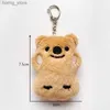 Keychains en peluche 1pcs grincement petit ours brun en peluche jouet mini-ours poupée jouet sac de trèflé