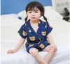 Zomer baby slaapkleding meisjes pyjama set jongens slaapkleding kinderen nachtkleding kinderen thuiskleding peuter cartoonbeer print 2 tot 7 jaar266181405