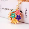 Keychains Lanyards Dalaful Chic Hollow Out Flower Metal Key Chains Rings Exquisite Purse Bag Buckle Pendant For Car Keyrings KeyChains K296 Y240417