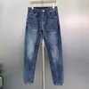 Concepteur de jeans masculin concepteur de haute qualité imprimé de haute qualité lavé de saison de saison masculin polyvalent élastique élastique slim slim pantalon droit de jambe droite