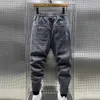 71kw jeans maschile maschile jogger casual jogger harem denim pantaloni hip hop elastica lettera di lettere jeans pantaloni maschi 2024 primavera new d240417