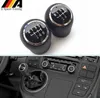 56 Acessórios de estilo de carro de velocidade MT MONOGEM MUNDA ALLAVAÇÃO DA CABEÇA DE BATA PARA VW T5 T51 GP 2003 2011 Gear Shifter KN3570197