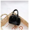 Torebki Dzieci Kwiat 2022 Projektanci Mini Shell Torby Cute Baby Girls Łańcuchy Crossbody Bag Zero Portfel F1158 Drop dostarczenie Matern OTY8M