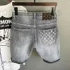 Designer de jeans masculin concepteur personnalisé Internet célébrité Imprimez des shorts en denim à cinq points pour hommes marques minces d'été