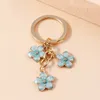 Keychains Lanyards Cute Enamel Keychain Colorful Sakura Flower Key Ring Sweet Key Chains for Women Girls Handbag Accessories DIY Jewelry Gifts d240417