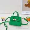 Bolsas 2022 Kids Candy Colors Bolsa Girls Metal Buckle Crossbody Bag Luxury Children Chain Pu Singer Bags Sagas Mãe e Durada Otkdi