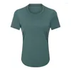 Aktiva skjortor Qumor Crew Neck T-shirt höftlängd Kvinnor Kort ärm Svettvickande Yoga-skjorta andas Running Soild Tops snabbtorkande