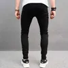 Jeans masculin American Fashion Black Red Patchwork Mens High Street Korean Slim pantalon Ripped Hip Hop Hop Pantalon Denim Male D240417