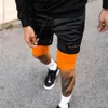 Podwójnie warstwowe spodenki jogger mężczyźni 2 w 1 krótkie spodnie siłowni fitness Wbudowany kieszonkowy Bermuda Szybkie suche spodenki plażowe męskie spodnie dresowe 240412