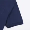 Högkvalitativ designerkläder Rätt utgåva sommar kortärmad vävd krage röd randig polo skjorta herr pocket blå t-shirt
