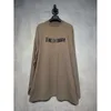 Hochwertige Designer-Kleidung High-End Paris Crack Buchstabe Khaki Farbe Unisex-feindliches T-Shirt Langarmed