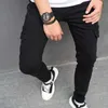Мужские джинсы 2024 Новые черные стройные мужские грузовые брюки мода хип -хоп уличная одежда мужская работа носить карманные джинсовые брюки D240417