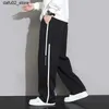 Men's Pants 2024 New Sports Pants Mens Pocket Jogger Wide Leg Jogging Pants Neutral Breathable Loose Outdoor Sports Pants Fashion Design Jogging Pants Q240417