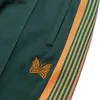 Pantaloni da uomo Aghi arrivati Pantaloni di progettazione bottoni Pantaloni farfalla ricamato a nastro ricamato pantaloni sportivi pantaloni verde extra grandi pantaloni nuovi Q240417