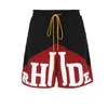 Rhude Grote print met tweekleurige trekkoord trend Casual Street Shorts Zipper Ademende capris