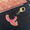 Sparkly Crystal Perfume Bottle Key Chain Letter Cartoon Key Ring for Gift Party Diy Bag Accessories