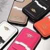 Designer Phone Case for iPhone 15 14 Pro Max Leather ، فاخر iPhone Case 15 14 Plus 13 12 11 Pro للنساء غطاء محفظة مضاد للسفن مع حامل البطاقة