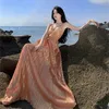 Casual Dresses 2024 Summer High Quality Luxury Golden Peat V-hals Spaghetti Strap Backless Party Long Dress Women Sexig Shiny Evening