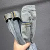 Jeans masculin 2024Summer Type mince en détresse rétro mode décontracté slim fit tout-correspondant pantalon recadré haut de gamme