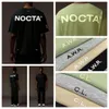 Nocta Designer Tide T Shirts Nocta Letterラミネートプリントショートスリーブハイストリートルーズ特大のカジュアルスポーツTシャツ100％ピュアコットントップ