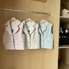 Kvinnors västar 2024 Summer Fashion Simplicity Pendling mångsidig knapp skarvad kortdräkt krage västjacka grov ull