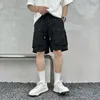 Stora fickbeklädda shorts för män sommar andas snabbt torkande capris streetwear fast färglast korta byxor 240412