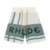 Correct Rhude Checkboard Cashew Flower American High Street Jacquard gebreide wollen losse casual split shorts voor mannen