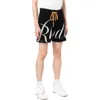 Rhude Fashion Brand American Summer High Street Sports Castary Jacquard編みゆるいカプリの男女のためのゆるいカプリショーツ