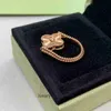 Roches de bijoux haut de gamme pour Vancleff Femmes Nouveaux anneaux à double face réversible CNC Sculpture V-Gold Jade Jade Four Leaf Grass Ring Original 1: 1 LOGO