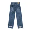 24SS تصحيح مصمم فني أنيق Allover Graffiti Print Denim Pants الخريف الشتاء الرجال غير الرسمي عتيقة شارع غسل الجينز بنطلون 0417