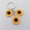 Keychains Lonyards Nouveaux fleurs de tournesol Résine Keychain Keychain Golden Sun Fleurs Keychain mignon Simplicité Style Daisy Fleur Keychain Meilleur ami Cadeaux D240417