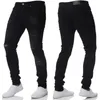 Jeans masculin printemps hommes élégants déchirés de mendiant détruit pantalon maigre masculin Hip Hop High Street Solid Jogging Crayon Denim Pantmand D240417