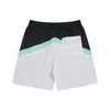 Rhude American Modes brandneue Herren und Frauen kontrastierender Farbpatchworkbrief drucken Loose Casual Mesh Schnelltrocknende Shorts für den Sommer